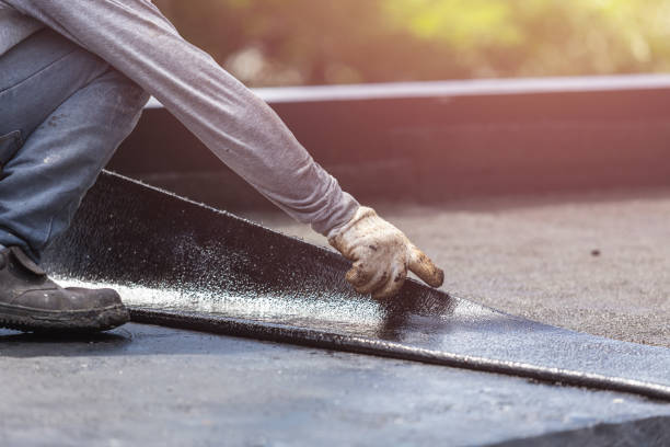 Professional Basement Waterproofing technician working in Alexandria, OH